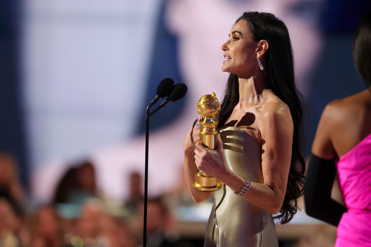 Demi Moore accepts her Golden Globe award on January 5.