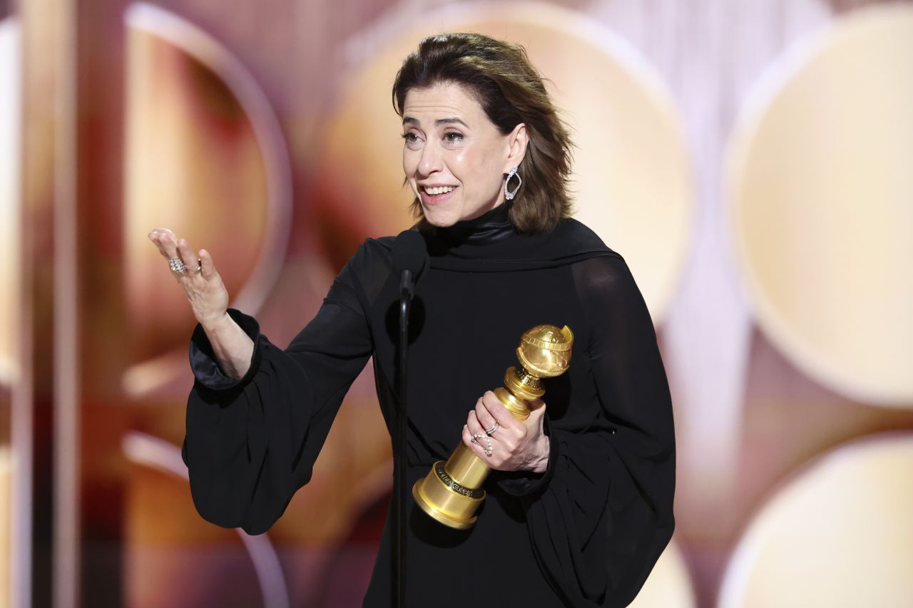 Fernanda Torres accepts the Golden Globe for best female actor in a drama film.