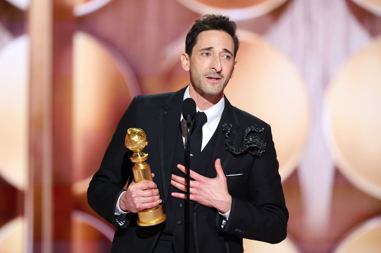 Adrien Brody accepts the Golden Globe award for best male actor in a drama film.