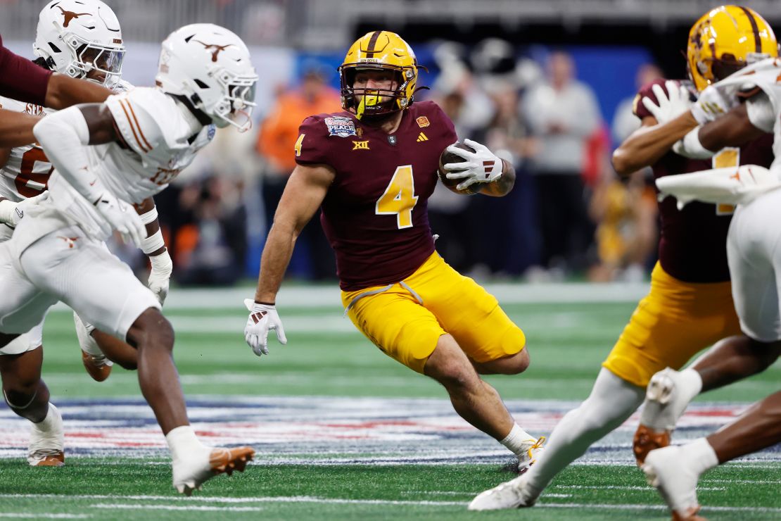 Cam Skattebo of the Arizona State Sun Devils runs the ball against the Texas Longhorns in Atlanta, Georgia, on January 1.