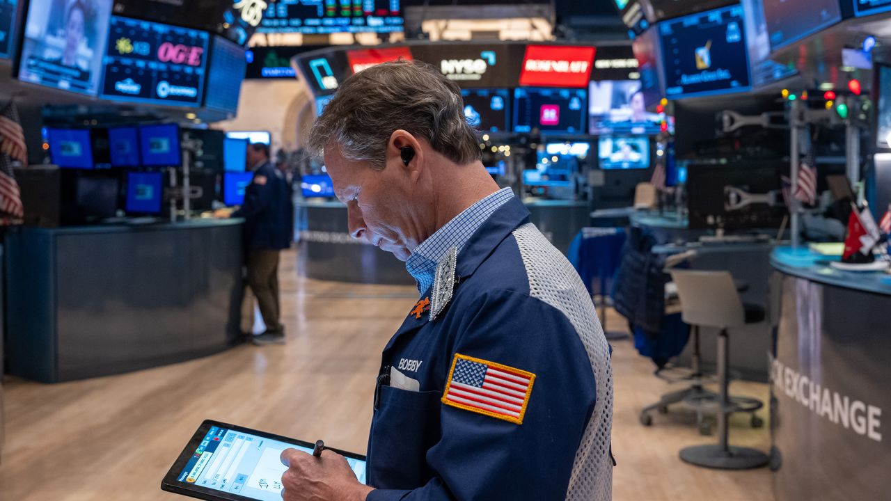 Traders work on the floor of the New York Stock Exchange (NYSE) on the first day of trading of the new year on January 02, 2025 in New York City.