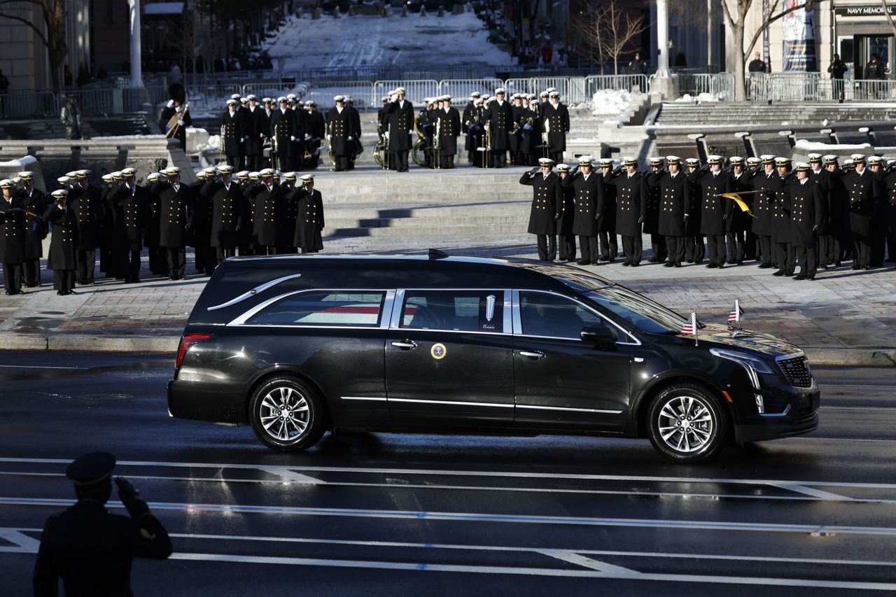 The hearse carrying the casket of former President Jimmy Carter arrives at the US Navy Memorial on January 7.