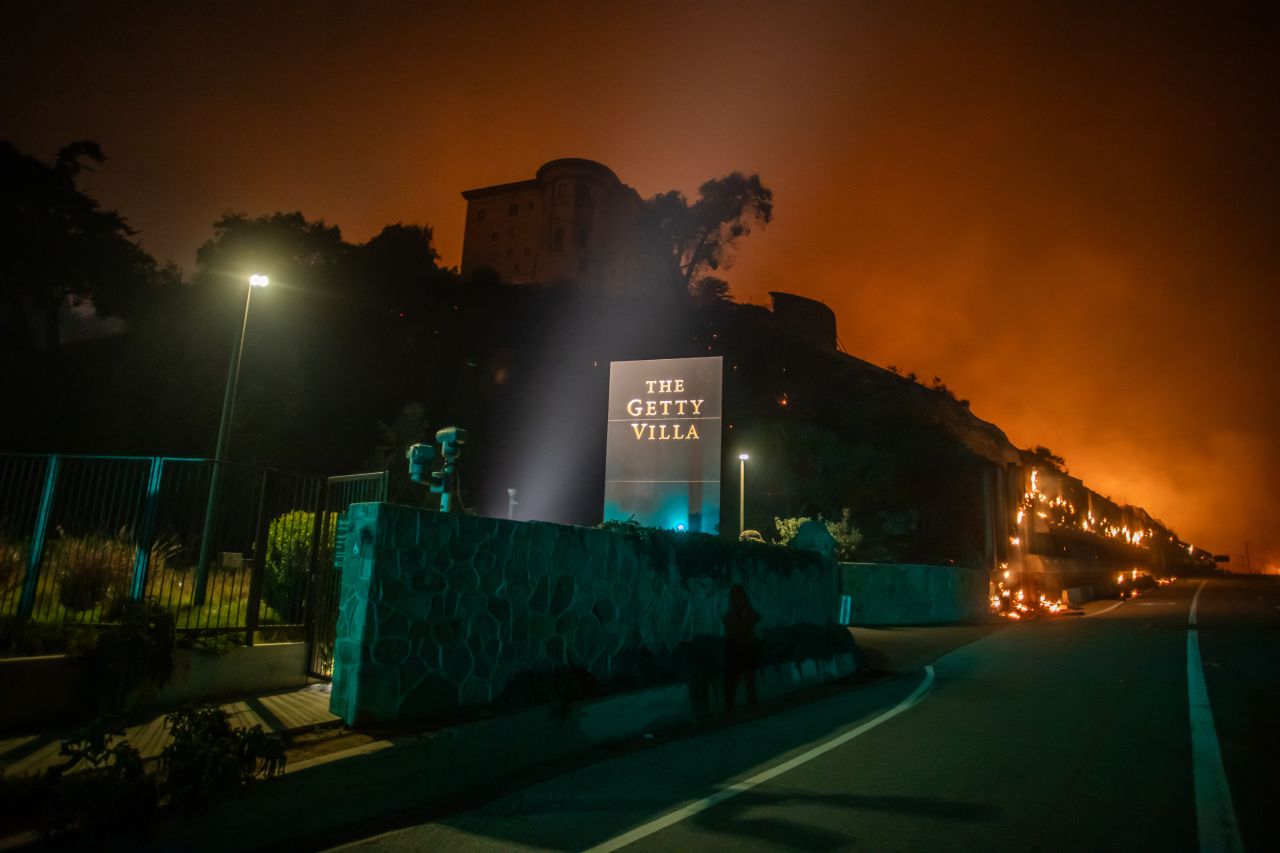 Flames from the Palisades Fire reach the grounds of the Getty Villa Museum on the Pacific Coast Highway amid a powerful windstorm on January 8, in Los Angeles.