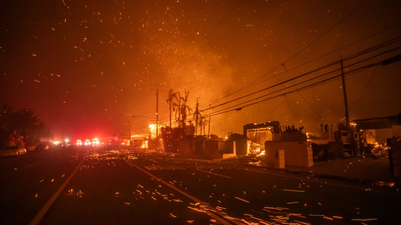 LOS ANGELES, CALIFORNIA - JANUARY 8: Strong winds blow embers as the Palisades Fire burns homes on the Pacific Coast Highway amid a powerful windstorm on January 8, 2025 in Los Angeles, California.  The fast-moving wildfire has grown to more than 2900-acres and is threatening homes in the coastal neighborhood amid intense Santa Ana Winds and dry conditions in Southern California. (Photo by Apu Gomes/Getty Images)