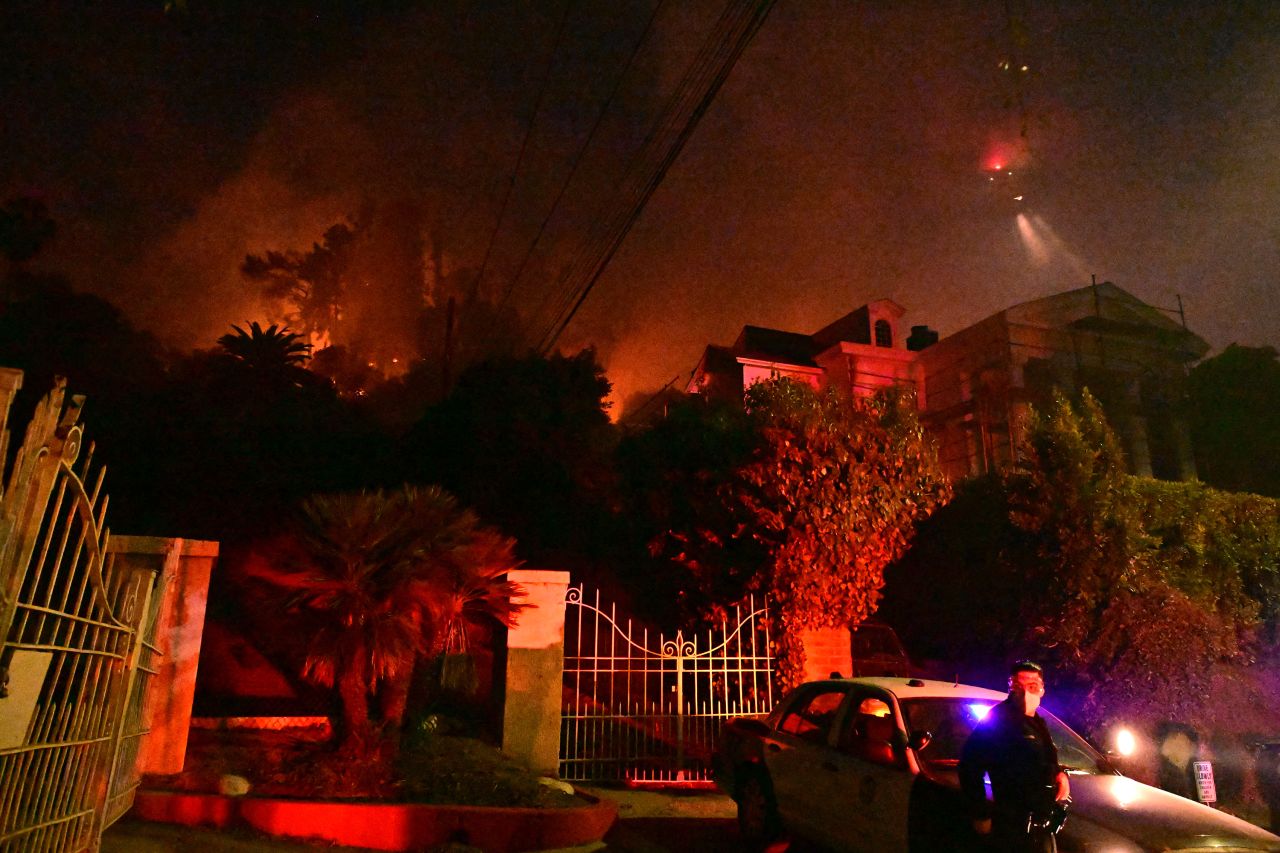 The Sunset Fire burns brush in the Hollywood Hills of Los Angeles on Wednesday, January 8.