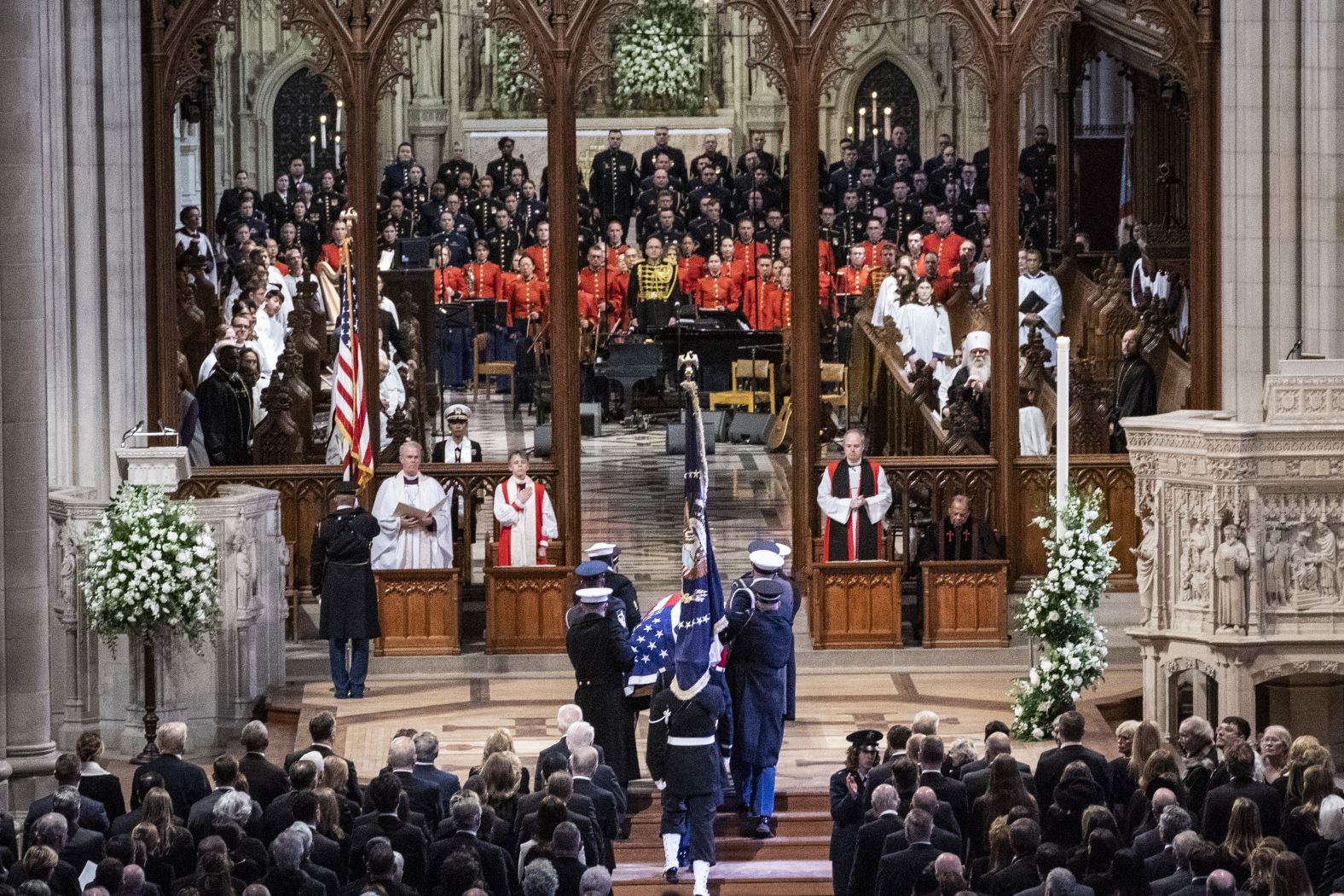 Carter's casket enters the cathedral.