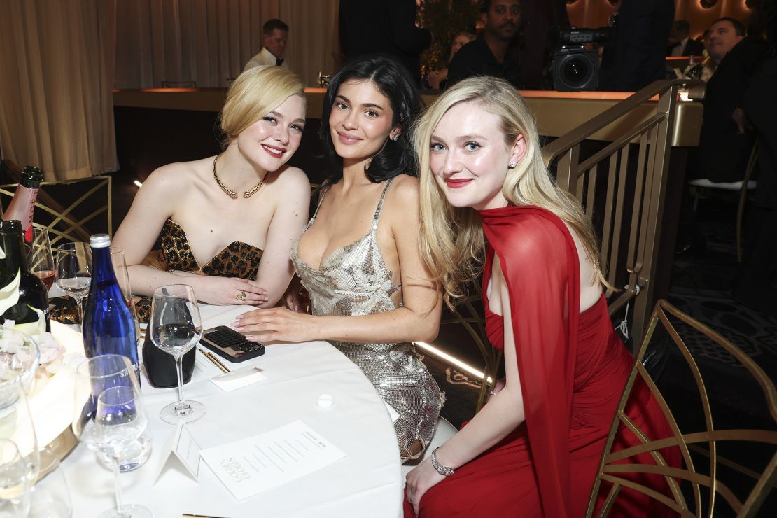 From left to right, Elle Fanning, Kylie Jenner and Dakota Fanning at the Golden Globe Awards in Beverly Hills, California.