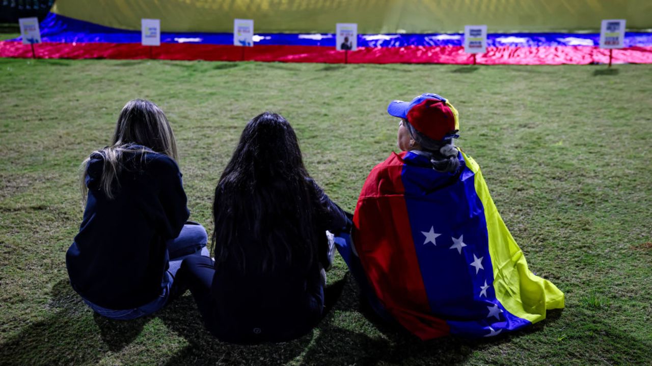 Demonstrators take part in a protest against the government of Venezuelan President Nicolas Maduro in Doral, Florida, on January 10, 2025. Maduro was sworn in for a third term January 10 in a ceremony decried as illegitimate by the opposition and internationally, with Washington offering a $25 million reward for his arrest. (Photo by Eva Marie UZCATEGUI / AFP) (Photo by EVA MARIE UZCATEGUI/AFP via Getty Images)