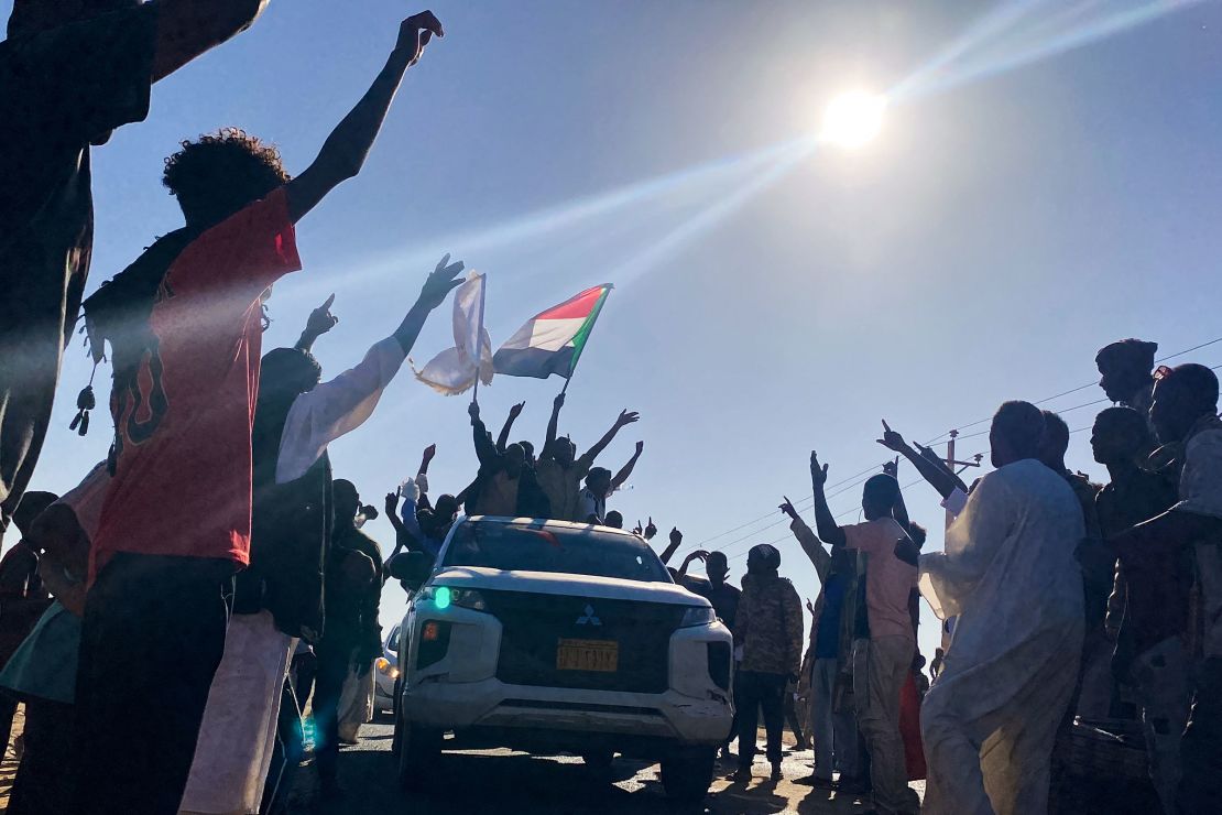 Sudanese people celebrate in Meroe, Sudan, on January 11 after the army announced in entered the Rapid Support Forces-held city of Wad Madani.