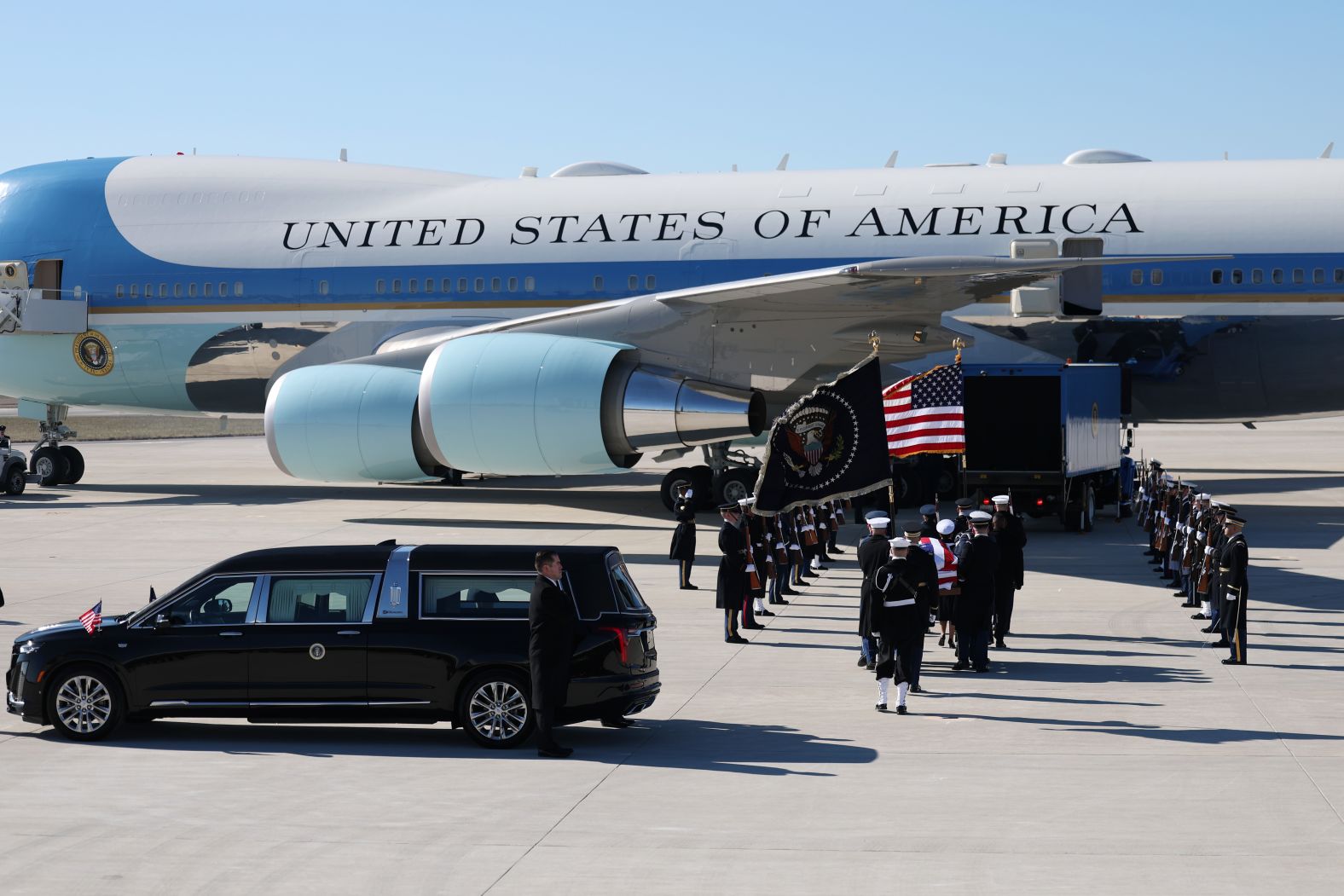 Carter's casket is transferred onto a plane in Marietta, Georgia, on January 7.