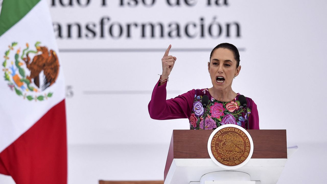 TOPSHOT - Mexico's President Claudia Sheinbaum speaks during an event to mark her first 100 days in office at the Zocalo Square, Mexico City, Mexico on January 12, 2025. Sheinbaum called on her supporters to celebrate her first 100 days in power, marked by threats from the US president-elect, Donald Trump, drug violence in Sinaloa (northwest) and more than 10 constitutional reforms. (Photo by Rodrigo Oropeza / AFP) (Photo by RODRIGO OROPEZA/AFP via Getty Images)