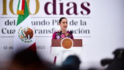 Mexico's President Claudia Sheinbaum speaks during an event to mark her first 100 days in office at the Zocalo Square, Mexico City, Mexico on January 12, 2025. Sheinbaum called on her supporters to celebrate her first 100 days in power, marked by threats from the US president-elect, Donald Trump, drug violence in Sinaloa (northwest) and more than 10 constitutional reforms. (Photo by Rodrigo Oropeza / AFP) (Photo by RODRIGO OROPEZA/AFP via Getty Images)