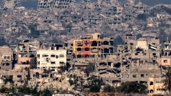 TOPSHOT - This picture taken from the Israeli side of the border with the Gaza Strip shows destroyed buildings in the northern Gaza Strip on January 13, 2025 amid the ongoing war between Israel and Hamas. (Photo by Menahem KAHANA / AFP) (Photo by MENAHEM KAHANA/AFP via Getty Images)