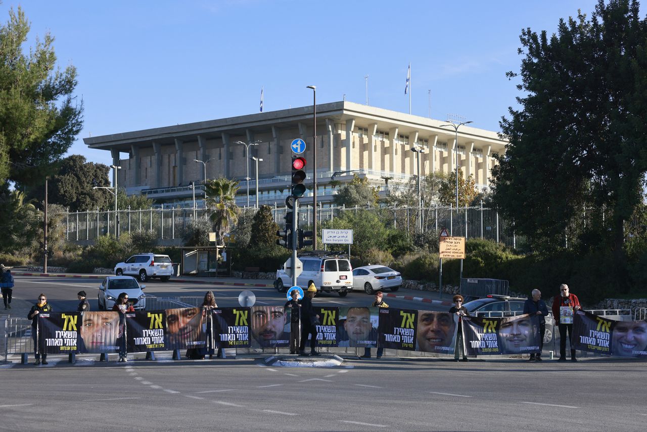 Relatives and supporters of Israelis held hostage in Gaza since October 2023 protest outside the Israeli parliament in Jerusalem on January 14, demanding a deal with the Palestinian group Hamas to secure their release.