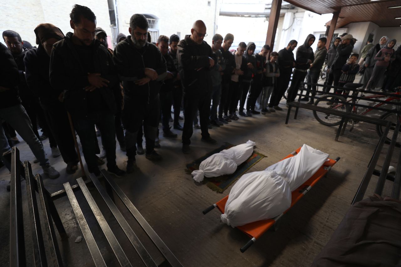 The bodies of Palestinians killed in an Israeli attack are brought to Al-Ahli Baptist Hospital in Gaza City on January 14.