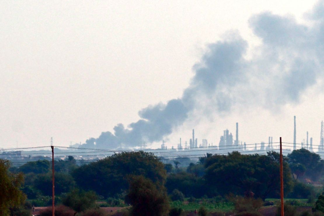 Smoke billows from al-Jaili oil refinery on January 15.