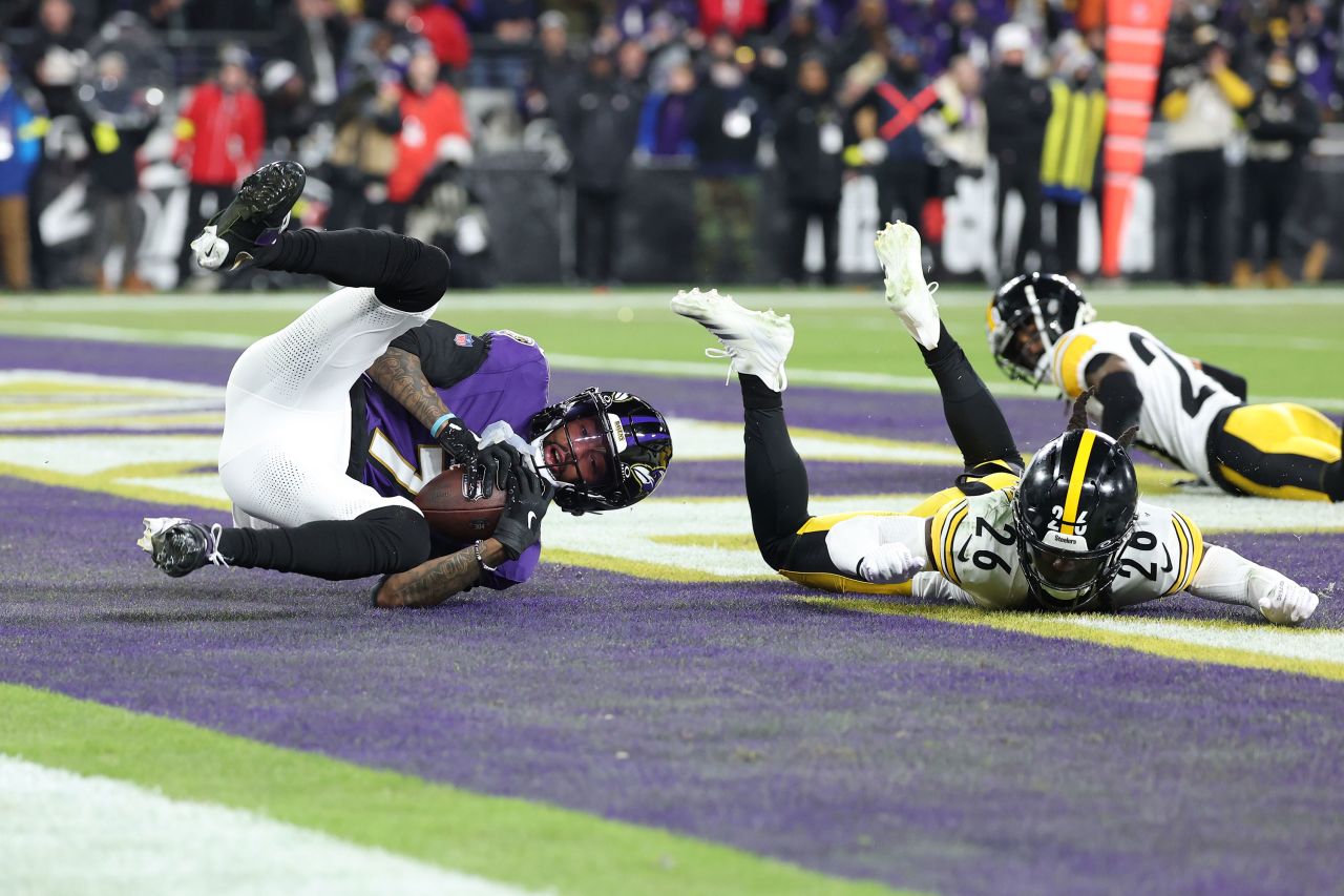 Baltimore Ravens wide receiver Rashod Bateman scores a touchdown.