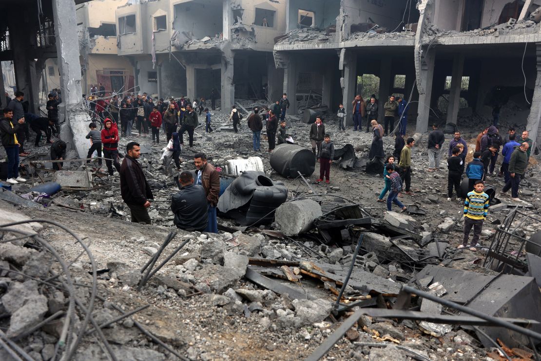 People check the rubble of buildings hit in Israeli strikes the previous night in Jabalia in the northern Gaza Strip, on January 16.