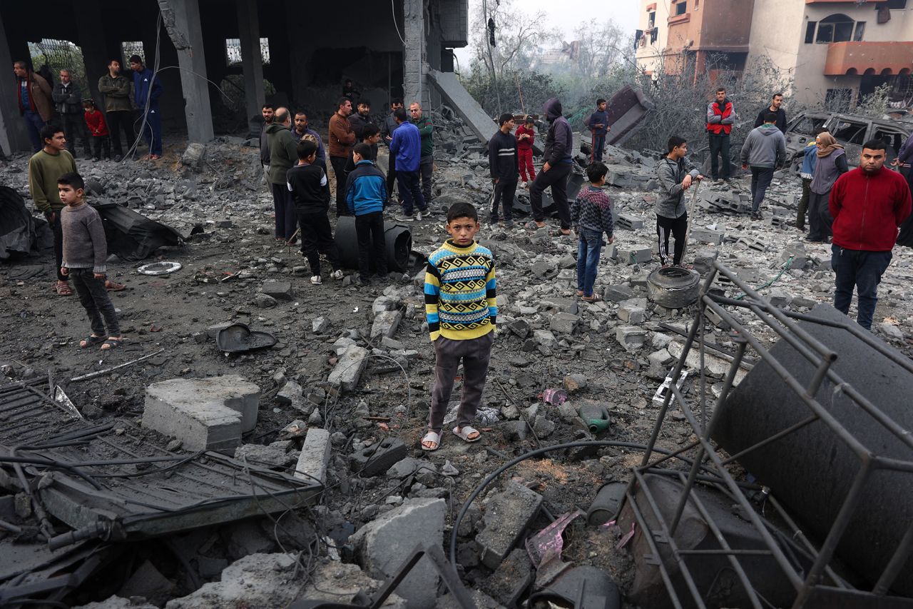 People check the rubble of buildings hit in Israeli strikes the previous night in Jabalia in the northern Gaza Strip, on Thursday.