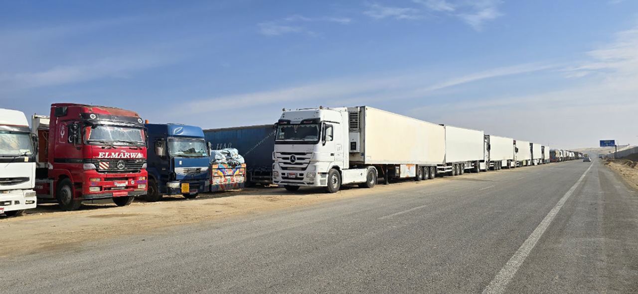 Aid trucks at the Rafah border crossing are viewed waiting to cross into Gaza, on Thursday in Egypt.