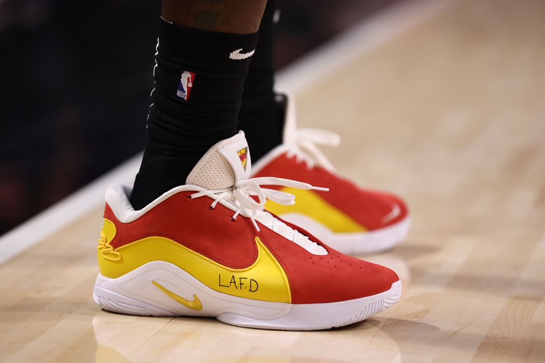 A display of the shoes worn by LeBron James showing support for the LA Fire Department on Monday night.