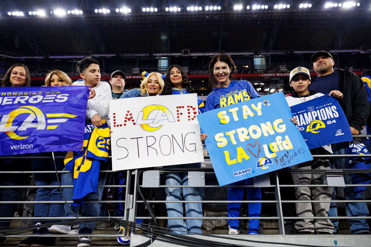 Los Angeles Rams fans show their support for the Los Angeles Fire Department ahead of Monday's NFC Wild Card game between the Rams and the Minnesota Vikings in Glendale, Arizona.