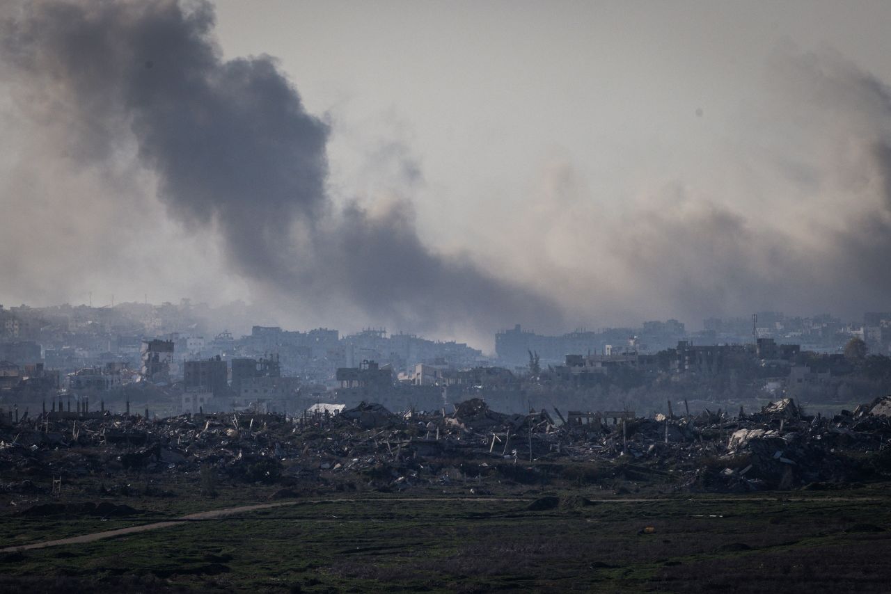 Smoke plumes rising from explosions above destroyed buildings in the northern Gaza Strip on Saturday.