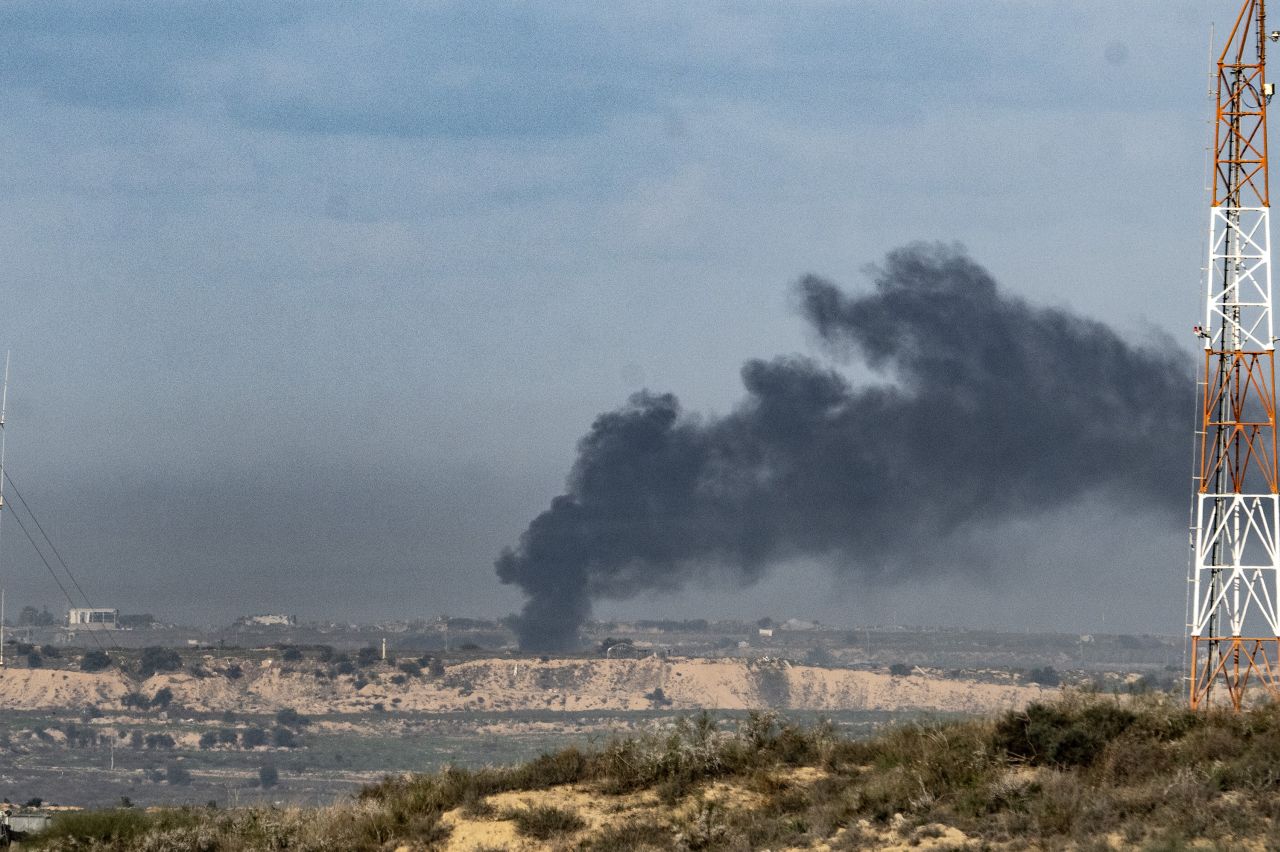 Smoke rises over the destroyed residential areas following the Israeli attacks on the northern Gaza on Sunday.