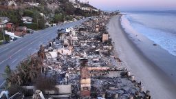 An aerial view of beachfront homes burned in the Palisades Fire as wildfires cause damage and loss through the LA region on January 15, 2025 in Malibu, California.