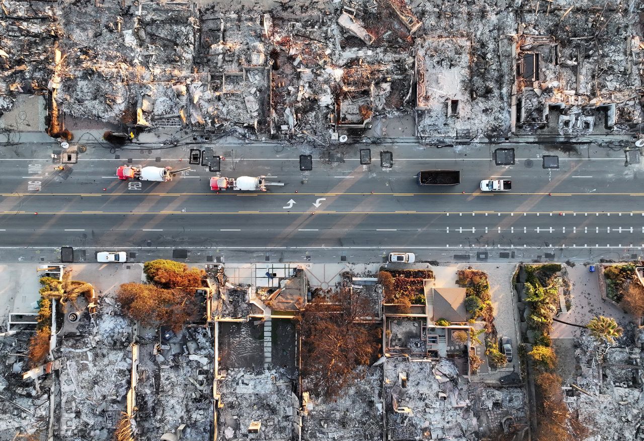 An aerial view of repair vehicles near beachside homes that burned in the Palisades Fire are seen on Wednesday in Malibu.