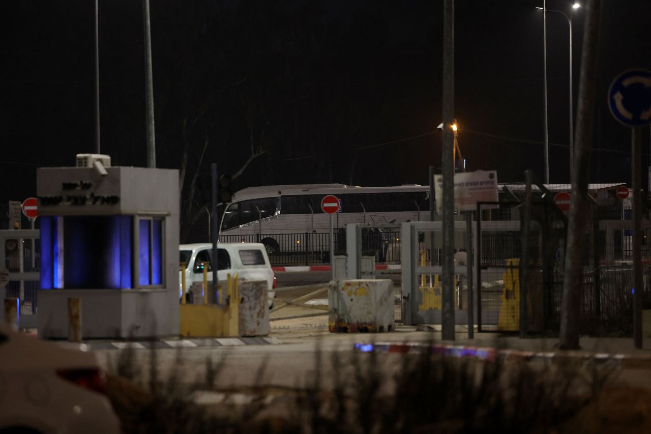 A Red Cross bus carrying freed Palestinian prisoners leaves the Ofer military prison, located between Ramallah and Beitunia in the occupied West Bank, early Monday local time.