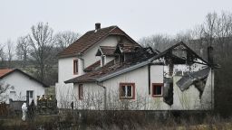 Firefighters attend the scene after a fire broke out at a retirement home on the outskirts of Serbia's capital Belgrade on January 20, 2025.