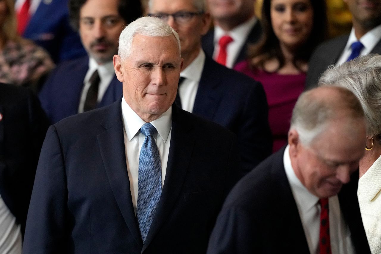 Former Vice President Mike Pence arrives for the inauguration ceremony in the Capitol Rotunda in Washington, DC on Monday.