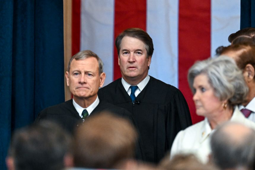 Chief Justice John Roberts and Justice Brett Kavanaugh arrive for the inauguration of U.S. President-elect Donald Trump in the U.S. Capitol Rotunda on January 20, 2025 in Washington, DC.