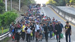 Migrants from a caravan in Tapachula, Chiapas state, Mexico, march while heading to the US border on January 20, 2025. US President Donald Trump was sworn in for a historic second term pledging a blitz of immediate orders on immigration aimed at re-shaping how the United States deals with citizenship and immigration, and the US culture wars as he caps his extraordinary comeback. (Photo by Isaac Guzman / AFP) (Photo by ISAAC GUZMAN/AFP via Getty Images)