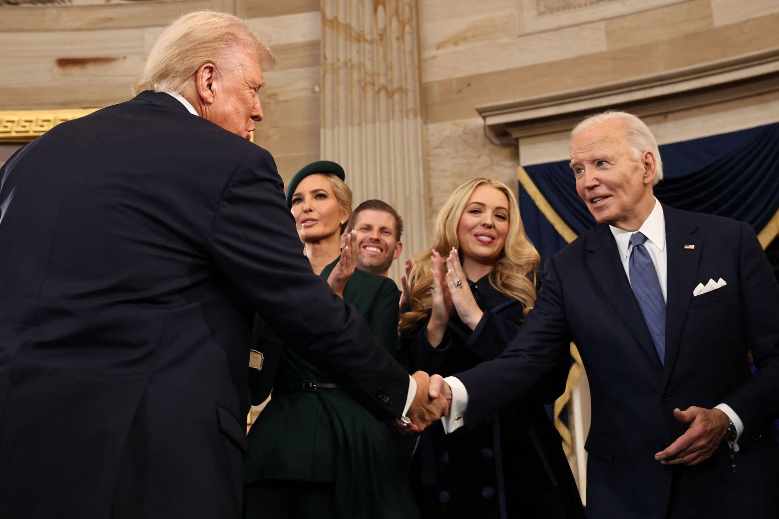 Donald Trump and Biden shake hands during Trump's inauguration ceremonies in January 2025.