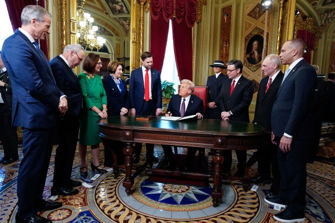 Vance stands beside Trump as he takes part in a signing ceremony in the President's Room at the US Capitol after being inaugurated in January 2025.