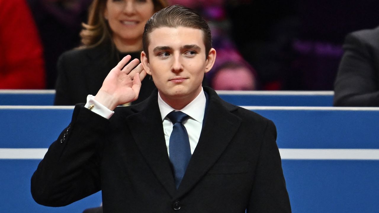 Video Barron Trump plays to the crowd after dad recognizes him at