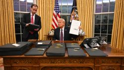 US President Donald Trump signs executive orders in the Oval Office of the WHite House in Washington, DC, on January 20, 2025. (Photo by Jim WATSON / POOL / AFP) (Photo by JIM WATSON/POOL/AFP via Getty Images)