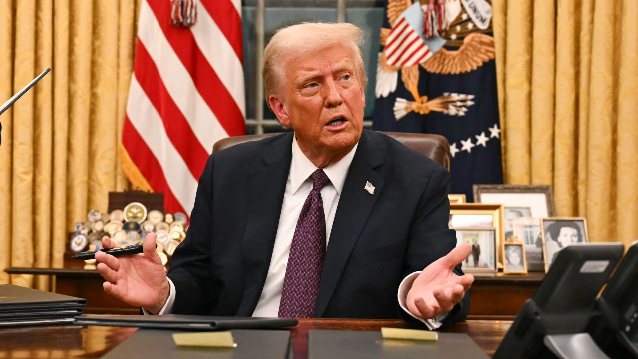 US President Donald Trump speaks to journalists about TikTok as he signs executive orders in the Oval Office of the White House in Washington, DC, on January 20, 2025. (Photo by Jim WATSON / POOL / AFP) (Photo by JIM WATSON/POOL/AFP via Getty Images)