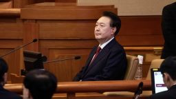 Yoon Suk Yeol, South Korea's president, attends a hearing at the Constitutional Court of Korea in Seoul, South Korea, on Tuesday, Jan. 21, 2025. Yoon made his first appearance at his impeachment trial on Tuesday, with security ramped up following the Capitol Hill-like rioting during his appearance at another court at the weekend. Photographer: Woohae Cho/Bloomberg via Getty Images