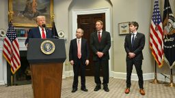 US President Trump speaks in the Roosevelt Room flanked by  Masayoshi Son (2L), Chairman and CEO of SoftBank Group Corp, Larry Ellison (2R), Executive Charmain Oracle and Sam Altman (R), CEO of Open AI at the White House on January 21, 2025, in Washington, DC. (Photo by Jim WATSON / AFP)
