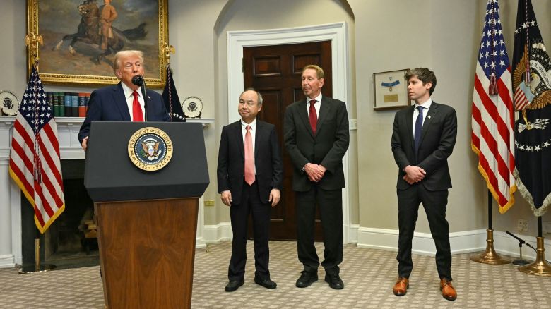 US President Trump speaks in the Roosevelt Room flanked by  Masayoshi Son (2L), Chairman and CEO of SoftBank Group Corp, Larry Ellison (2R), Executive Charmain Oracle and Sam Altman (R), CEO of Open AI at the White House on January 21, 2025, in Washington, DC. (Photo by Jim WATSON / AFP)