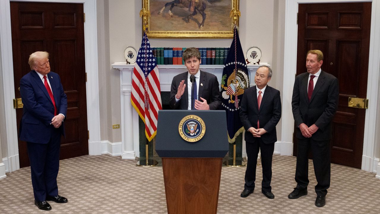 OpenAI CEO Sam Altman, accompanied by U.S. President Donald Trump, Oracle CTO Larry Ellison (R), and SoftBank CEO Masayoshi Son (2nd-R), speaks during a news conference in the Roosevelt Room of the White House on January 21, 2025 in Washington, DC. Trump announced an investment in artificial intelligence (AI) infrastructure and took questions on a range of topics including his presidential pardons of Jan. 6 defendants, the war in Ukraine, cryptocurrencies and other topics.