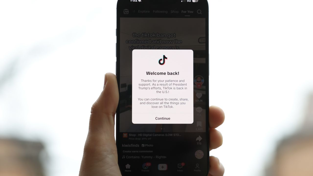 WASHINGTON D.C. - JANUARY 19: In this photo illustration an iPhone displays a popup message on the social media platform TikTok on January 19, 2025 in Washington, D.C. The popular platform is now welcoming users back after being unavailable on January 18 to users inside of the United States after a U.S. Supreme Court ban took effect. (Photo illustration by Kayla Bartkowski/Getty Images)