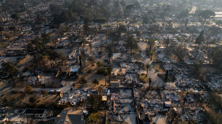 In an aerial view, residential areas destroyed by the Eaton Fire are seen on January 19, 2025 in Altadena, California.