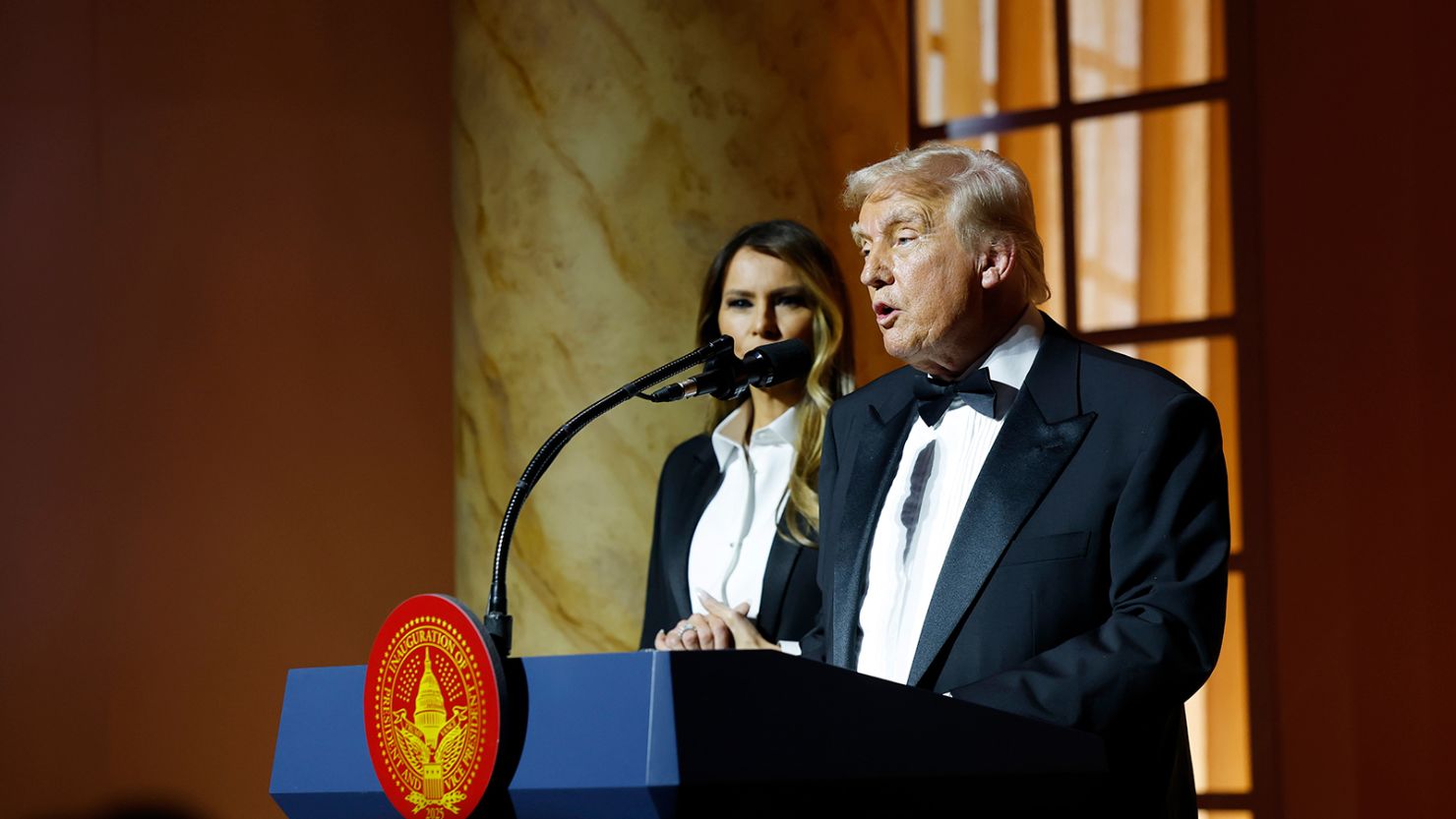 US President-elect Donald Trump gives remarks alongside Melania Trump at the National Building Museum on January 19 in Washington, DC.