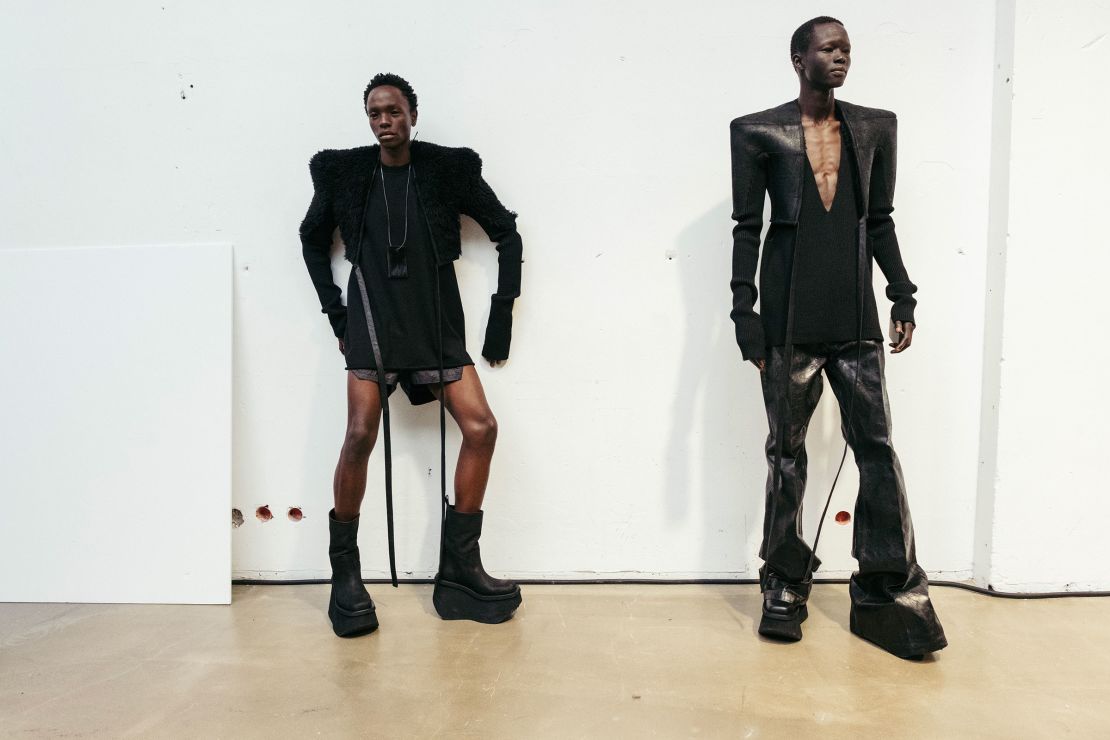 Models pictured backstage during Rick Owens' show, where the American designer unveiled his futuristic new collection.