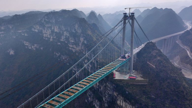 Aerial view of a construction site of the Huajiang Grand Canyon Bridge on January 17, 2025 in Zhenfeng County, Qianxinan Buyei and Miao Autonomous Prefecture, Guizhou Province of China.