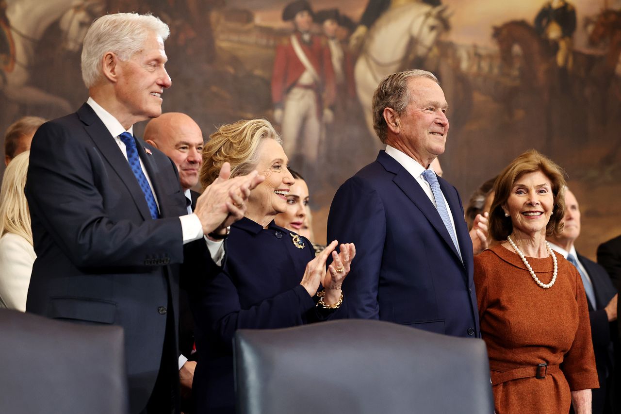 Former President Bill Clinton, former Secretary of State Hillary Clinton, former President George W. Bush and former first lady Laura Bush arrive to the inauguration of President-elect Donald Trump on Monday.